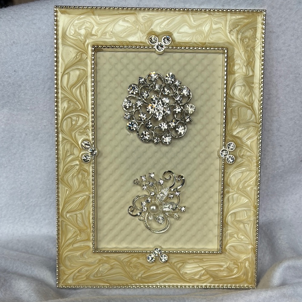 Elegant Gold and Silver Framed jewelry art